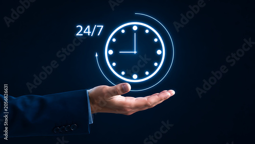 Businessman holding a glowing 247 clock icon in his hand, representing continuous availability, roundtheclock service, and constant support in business
