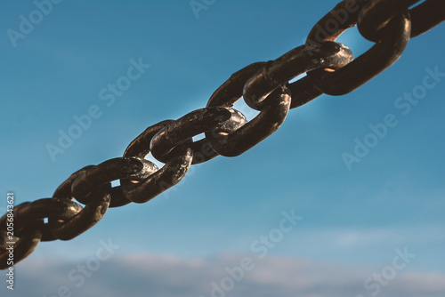 Bild auf Leinwand Iron Chain Against the Sky