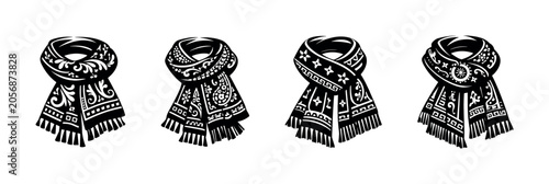 Tableau sur toile Collection of four intricately patterned winter scarves with fringe details