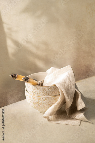 Cream bowls on a cream background 