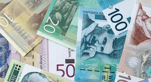 Bild auf Leinwand Serbian dinar money bills in pile on table