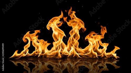 Bright orange fire flames burning on black background with reflection.