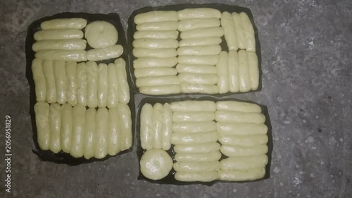 Top View of Three Trays of Raw Egyptian Fayesh Dough