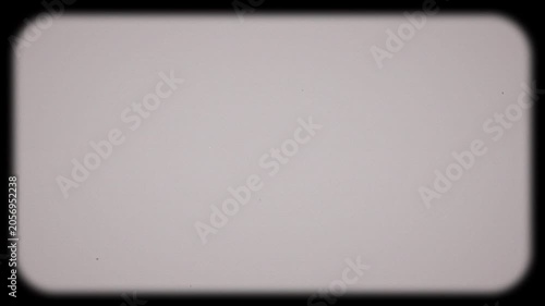 Minimalistic vintage projector frame overlay with soft focus gray screen and rounded border. 4K Video