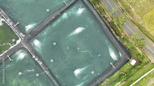 Top Down Drone Zoom Out Above Coastal Shrimp Farm Near Pantai Cemara Indonesia