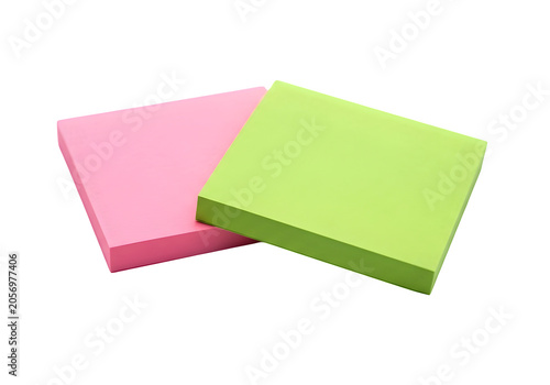 Two overlapping sticky notes in pink and green colors