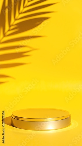 a yellow wall with a shadow of a palm leaf