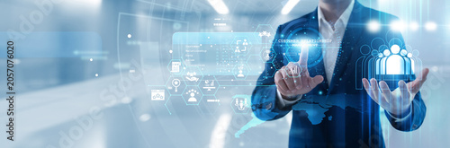 CRM specialist hand touching customer relationship management dashboard to track lead interactions, analyze client data and improve sales performance for a thriving business model currently.