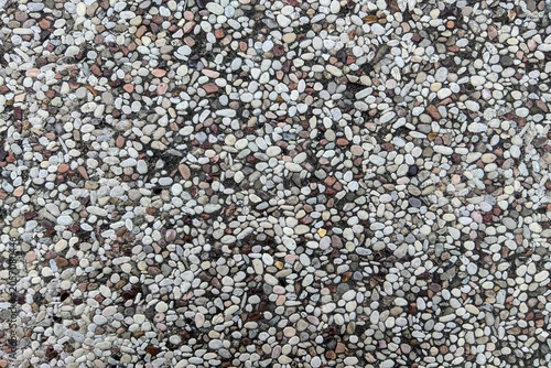Tableau sur toile Exposed aggregate concrete texture, small mixed river stones.