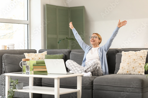 Happy woman stretching arms...