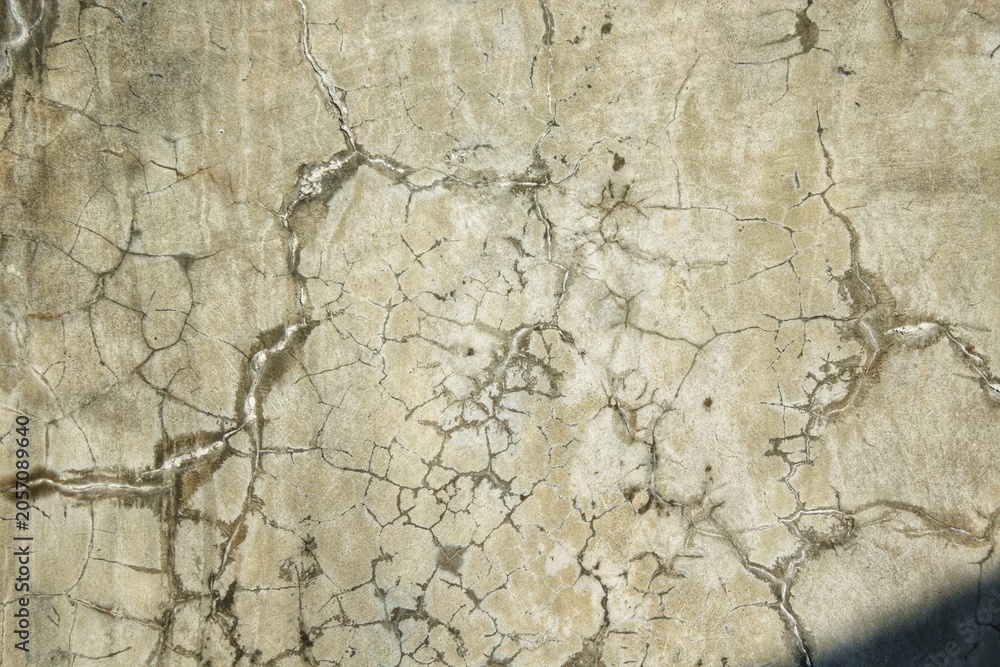 Fototapeta premium Weathered cracked wall texture.