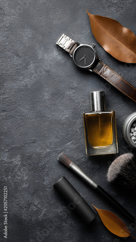 Flat lay composition with men's cosmetic products on grey background. Space for design