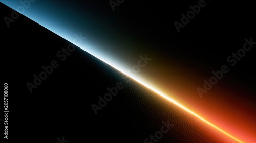 A vibrant diagonal light beam transitions from cool blue to warm orange against black