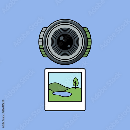 A digital camera lens sits above a printed landscape photograph