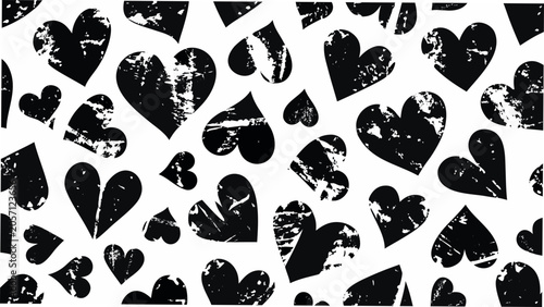 Fotografie Distressed heart shapes pattern with textured black and white coloration abstrac