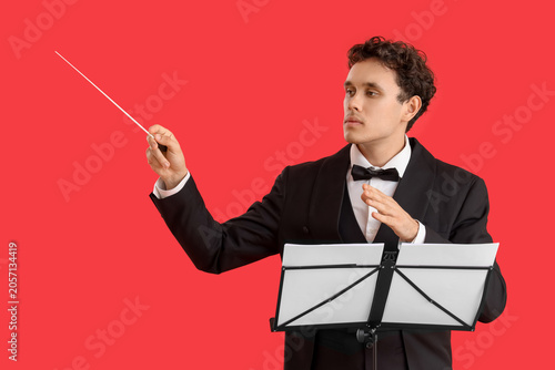 Young male conductor with n...