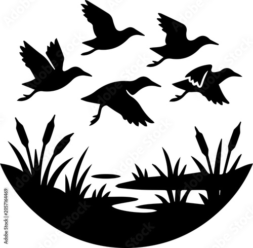 black rail birds flying in the air in group