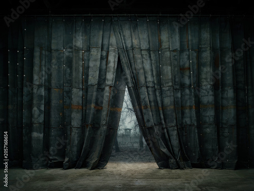 Iron curtain, heavy industrial metal curtains parted to reveal a misty landscape with a watchtower in the distance. Generative AI.