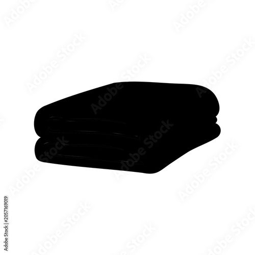 Photos Dark monochrome silhouette of a folded blanket or towel pile bedding