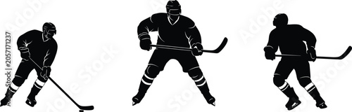 Photography Silhouettes of ice hockey players skating, defending, and controlling puck showc