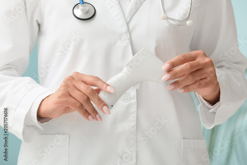Medical professional holdin...