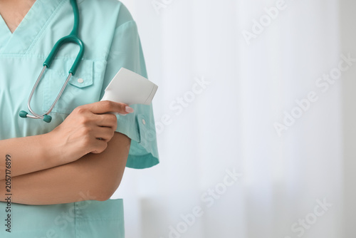 Medical professional holdin...