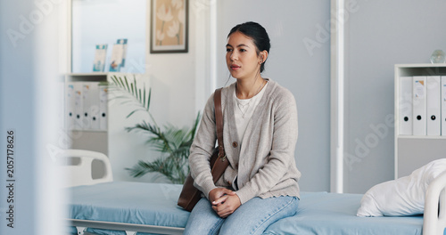 Картината върху платно Thinking, woman and waiting in hospital with anxiety, appointment and concern for medical results