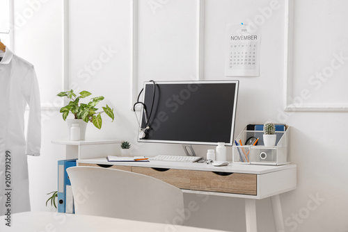 Modern doctors office desk ...