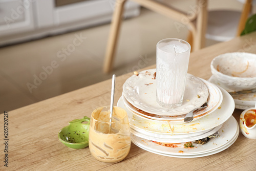 Dirty dishes on wooden coun...