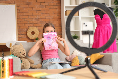 Teenage fashion blogger wit...