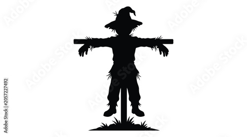 Photos Scarecrow figure with outstretched arms black silhouette