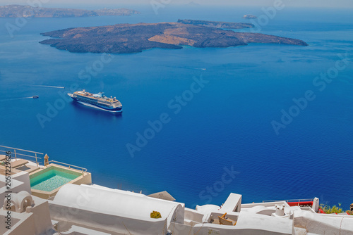 Картината върху платно Santorini, Greece, the caldera panorama with a cruise ship sailing on deep blue