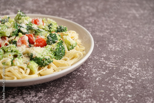 Plate of tasty pasta with b...