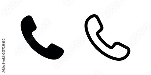 Foto Telephone receiver icons, one solid black, one outlined, on a white background