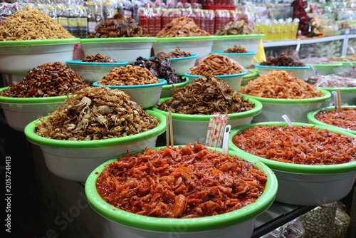 Photos Abundant Variety of Dried Seafood and Spiced Vietnamese Foods Heaped in Green Bo