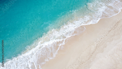 Obraz na plátně Aerial birdseye view above tropical island destination with turquoise ocean wate