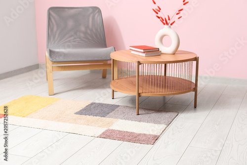 Grey armchair, coffee table...