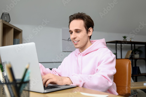 Male freelancer working wit...