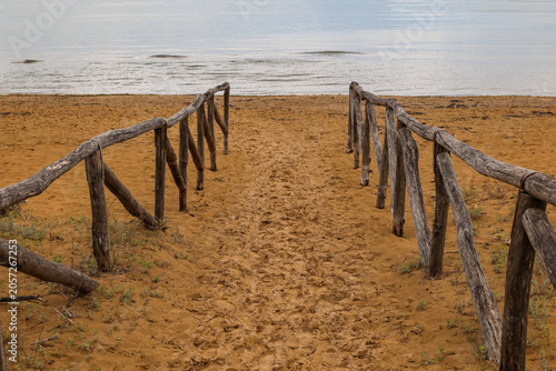 Wooden fence pathway to cal...