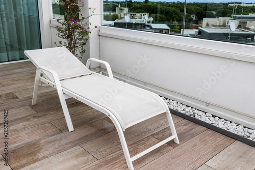 Modern white outdoor lounge...