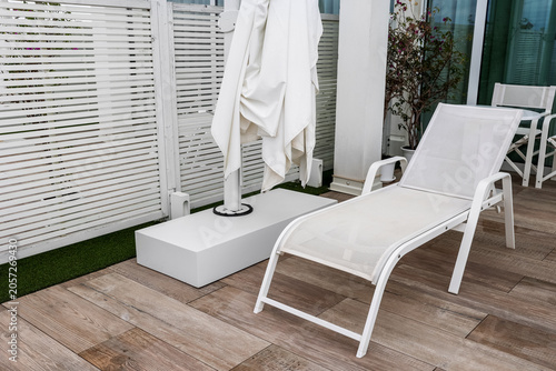 Modern white outdoor lounge...