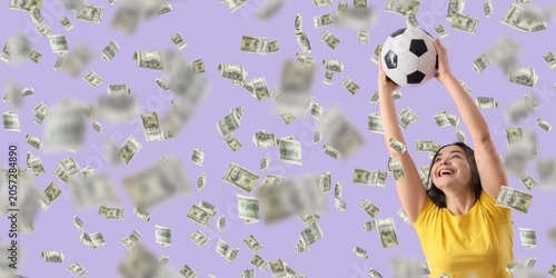 Konstfotografi Excited woman holding soccer ball with falling money, sports betting and financi