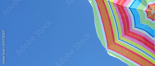Colorful striped beach umbr...
