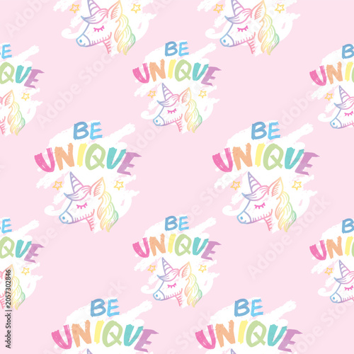 Vector seamless pattern with unicorns, hand drawn lettering quote. Be Unique.