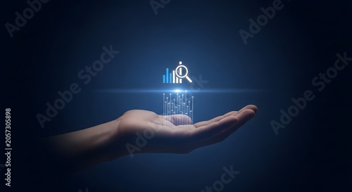 Data analysis and market research concept, hand holding glowing digital icons of magnifying glass and bar chart, futuristic business intelligence technology