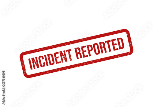 Red rubber stamp with the text incident reported on a page document