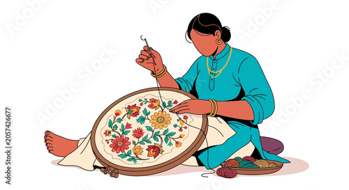 Woman creating traditional Indian embroidery art.