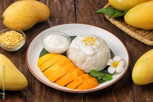 Photos Mango sticky rice is a Thai dessert made from sticky rice, mango and coconut milk