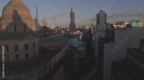 City skyline at sunrise with buildings and a clock tower in Buenos Aires