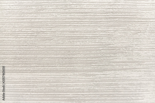 Abstract light beige textured background with horizontal lines. Copy space 